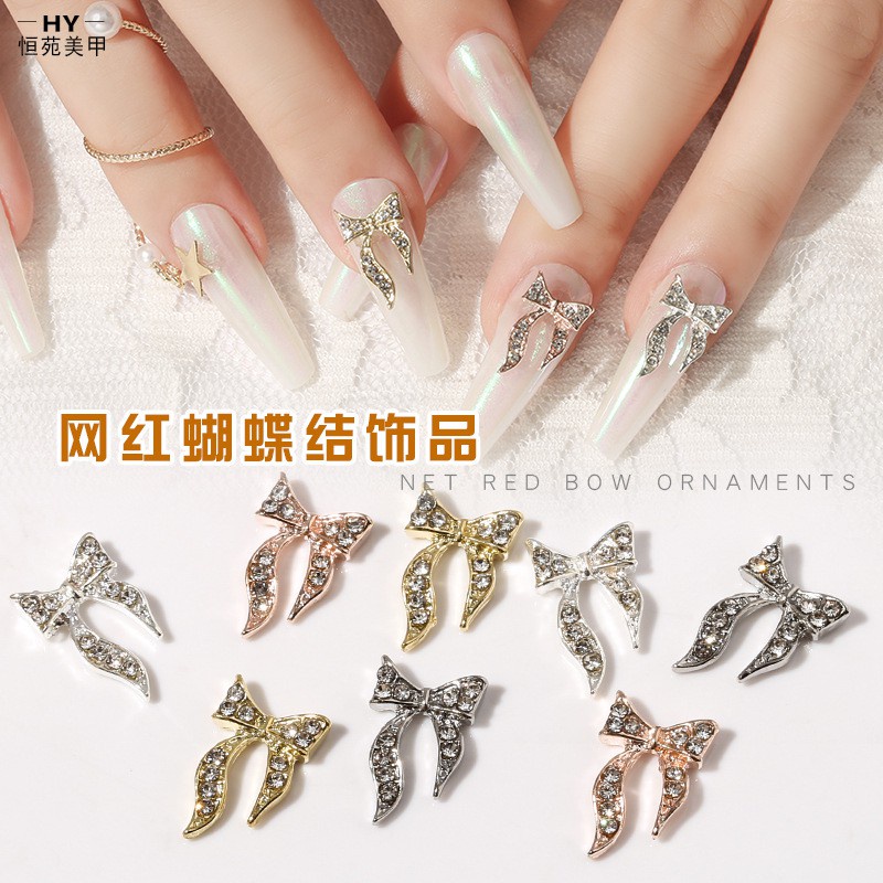 [Hàng mới về] Phụ kiện hình nơ lấp lánh bằng hợp kim màu bạc/ vàng đính móng xinh xắn