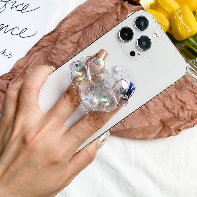 Giá Đỡ Điện Thoại Hình Hoa Màu Laser Trong Suốt Có Đệm Khí Màu Trơn