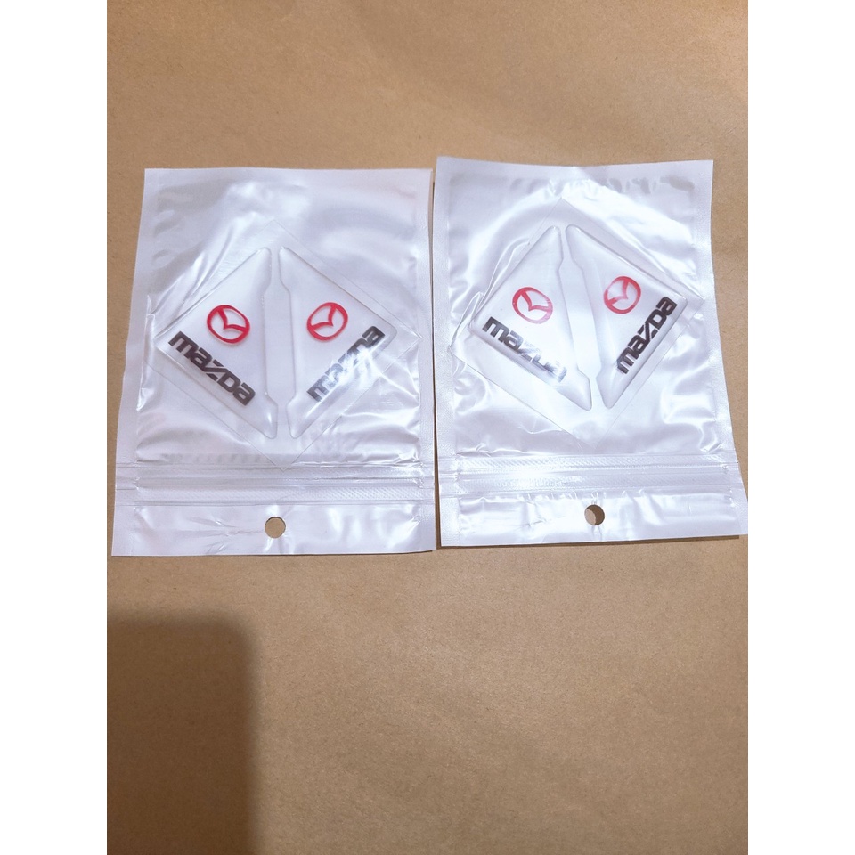 Bộ 04 Miếng dán chống va chạm , trầy xước góc cửa ô tô có Logo hãng xe