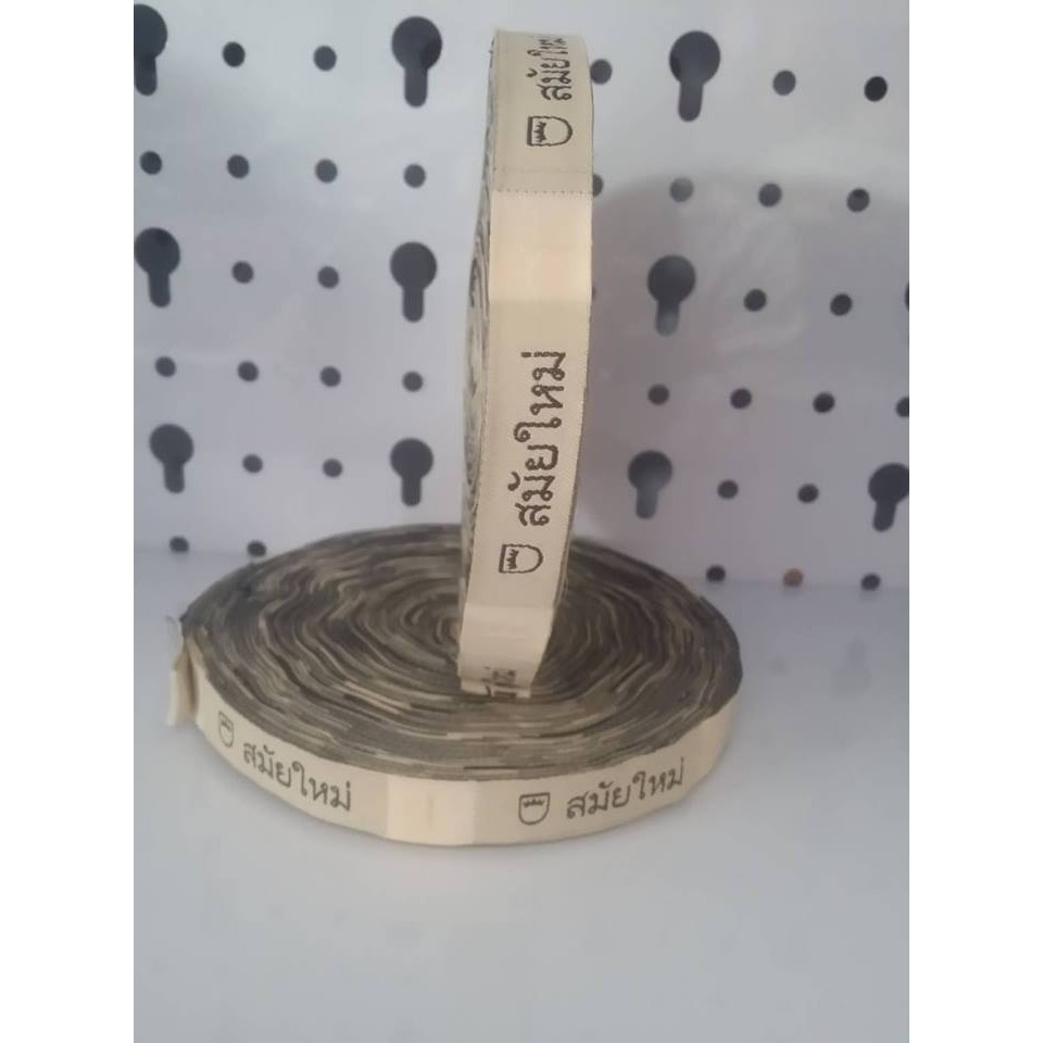 Mác quần áo chữ Thái.