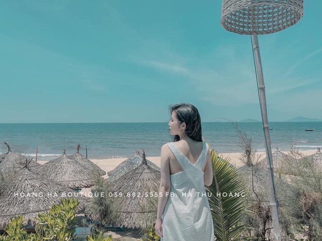 Váy đũi nhăn đan chéo lưng màu trắng dáng dài form rộng