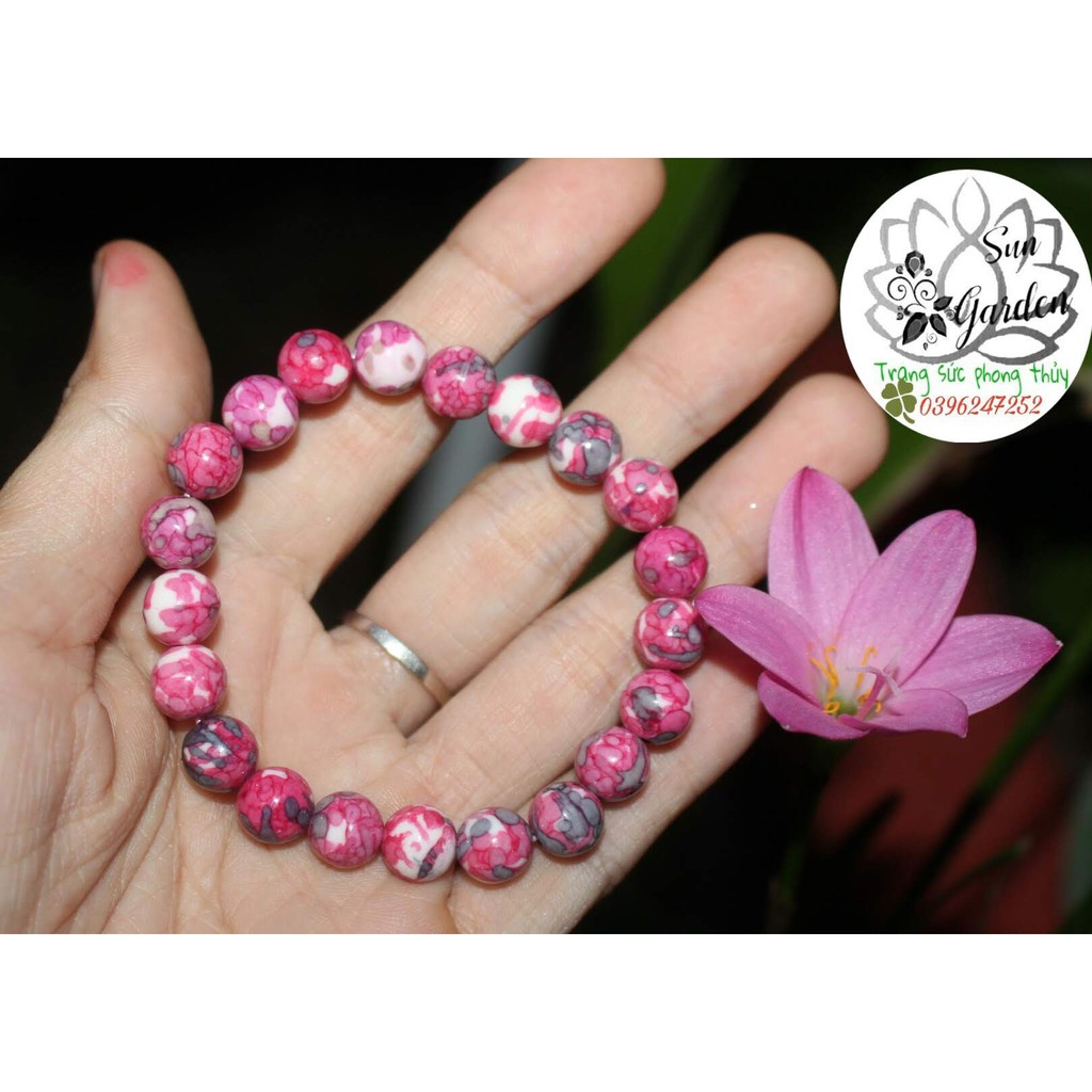 Vòng tay gỗ hóa thạch màu hoa đào 8ly