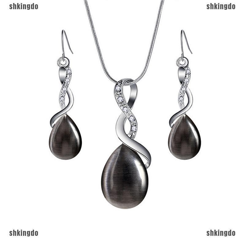 Bộ dây chuyền và bông tai đính ngọc mắt mèo