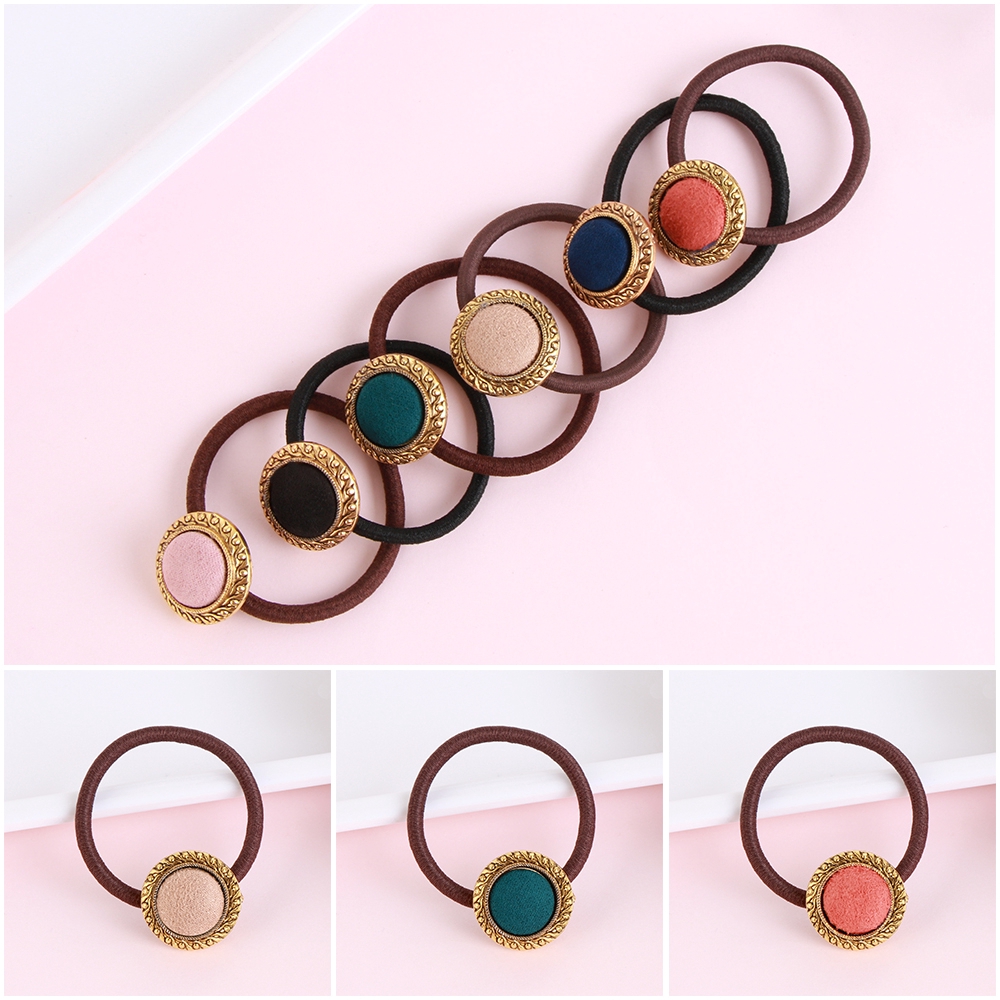 Cài tóc đính nút thời trang nữ tính