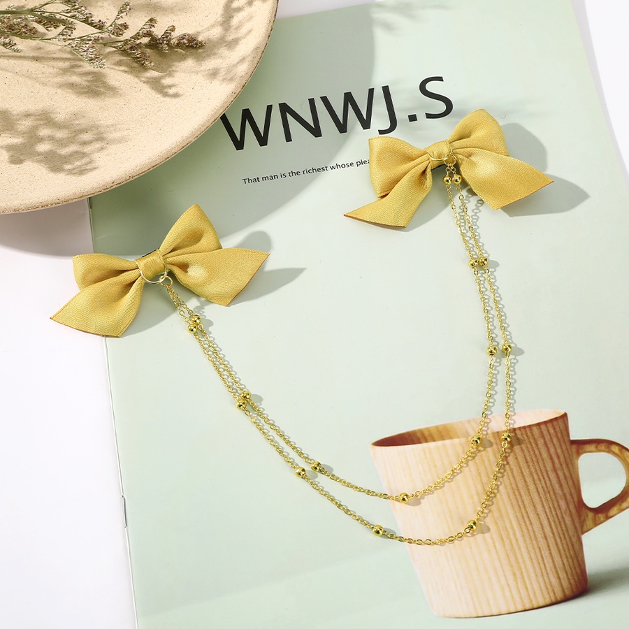 Kẹp tóc hình nơ phối chuỗi ngọc trai phong cách thanh lịch cho nữ