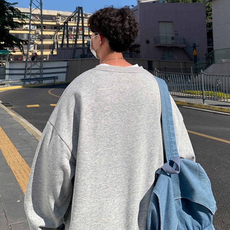 Áo sweater chui đầu tay dài cổ tròn dáng rộng in chữ màu trơn phong cách Hàn Quốc cỡ M-5XL cho nam