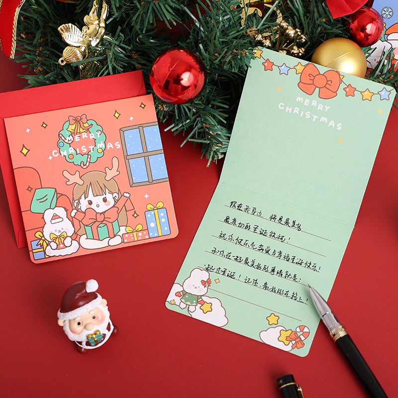 Set 4 Thiệp Giáng Sinh Hình Cô Gái Hoạt Hình Kèm Phong Bì