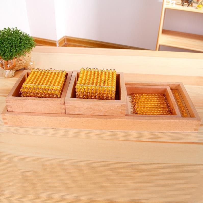 Giáo cụ Montessori - Bộ cườm vàng hệ thập phân