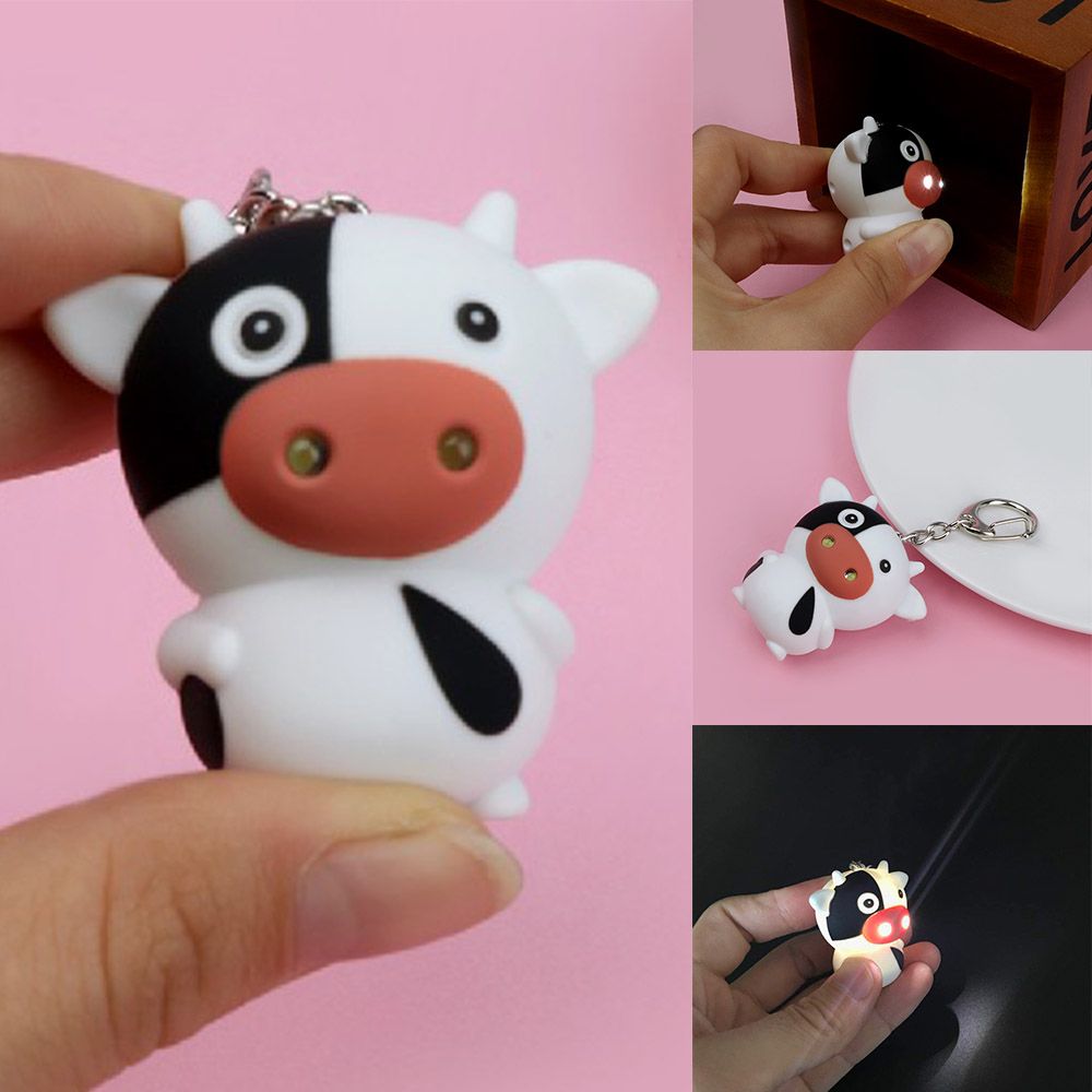 Móc Khóa Hình Bò Sữa Có Đèn Led Phát Sáng