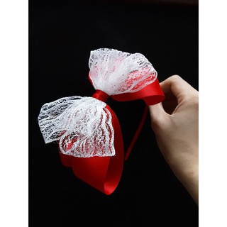 Cài tóc đỏ nơ ren to cho bé