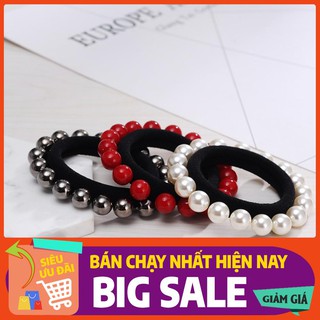 1 chiếc dây buộc tóc đính ngọc trai