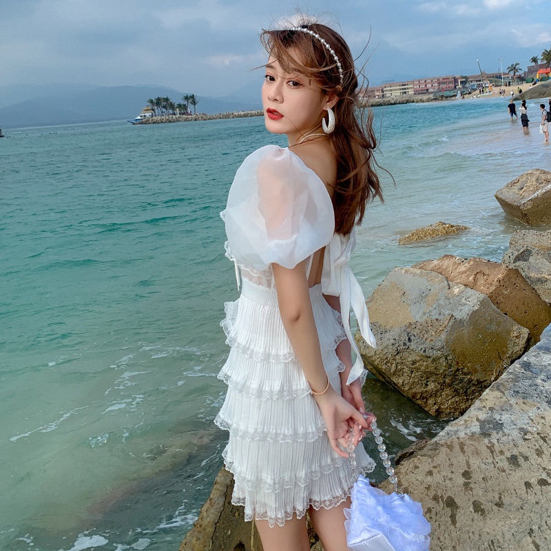 IELGYĐầm Ngắn Dáng Ôm Hở Lưng Phối Lưới Màu Trắng Thời Trang Cho Nữ