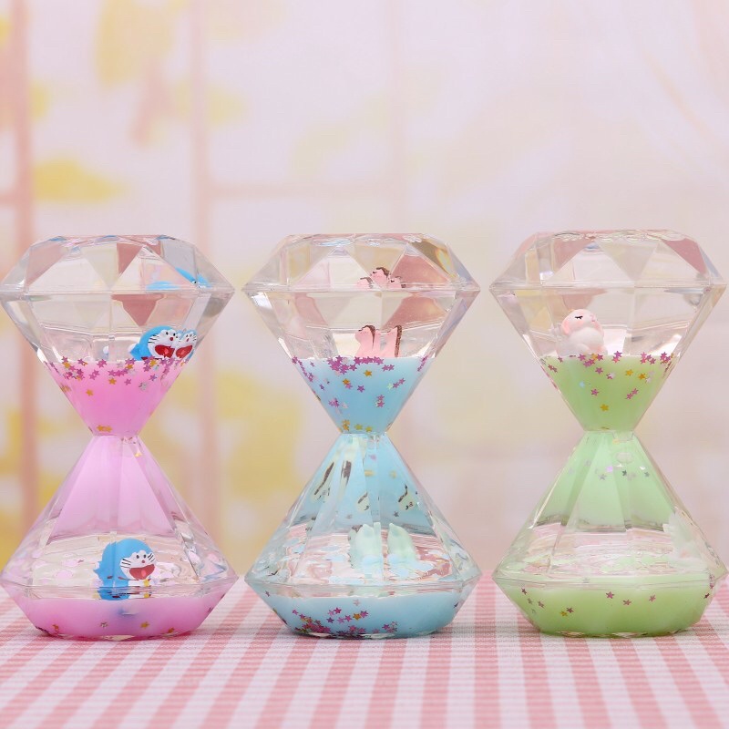 Đồ trang trí , đồng hồ cát lỏng hình viên kim cương , trang trí bàn làm việc , quà lưu niệm ý nghĩa