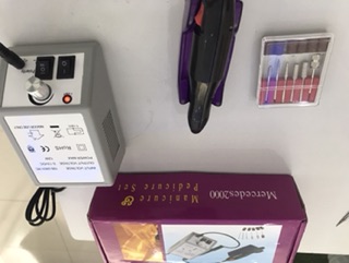 Máy mài móng tự đông.