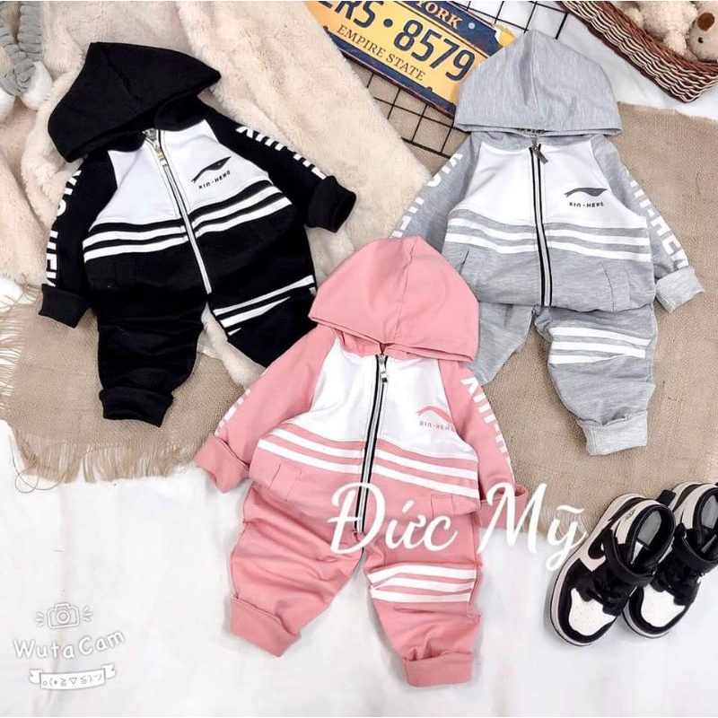 Bộ thể thao khóa kéo dây viền kem mũ cho bé trai bé gái