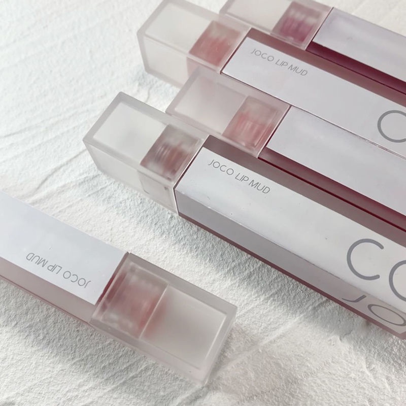 Son Môi Bùn Dạng Ống Màu Trắng Dâu Tây Trong Suốt Có Vỏ Màu Trắng