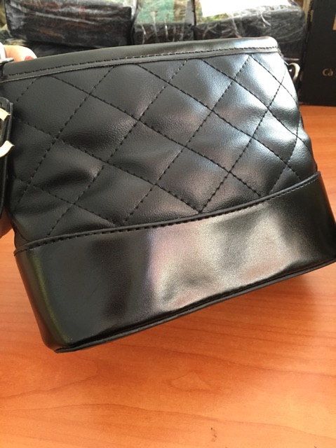 Túi đeo pha màu,da dập