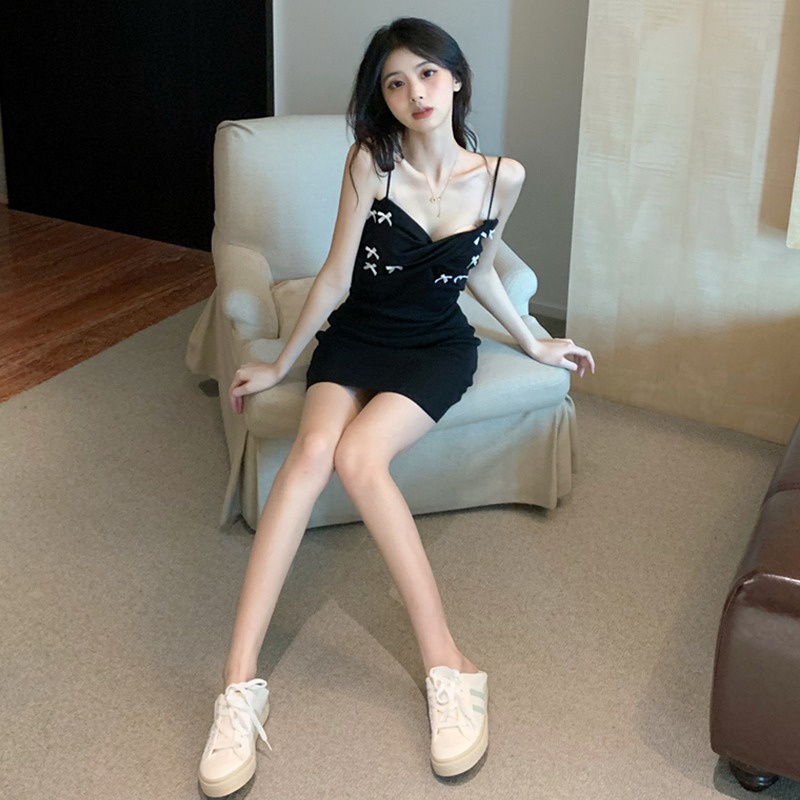 Đầm hai dây dệt kim ZHELIHANGFEI màu đen đính nơ ôm dáng quyến rũ
