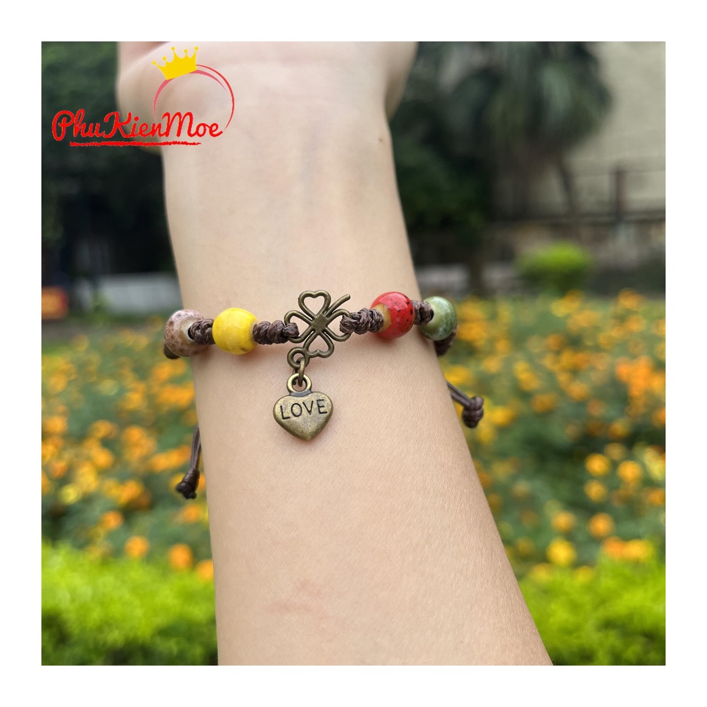 Vòng tay dây rút hạt thổ cẩm hình chiếc lá may mắn gắn tim handmade PhuKienMoe