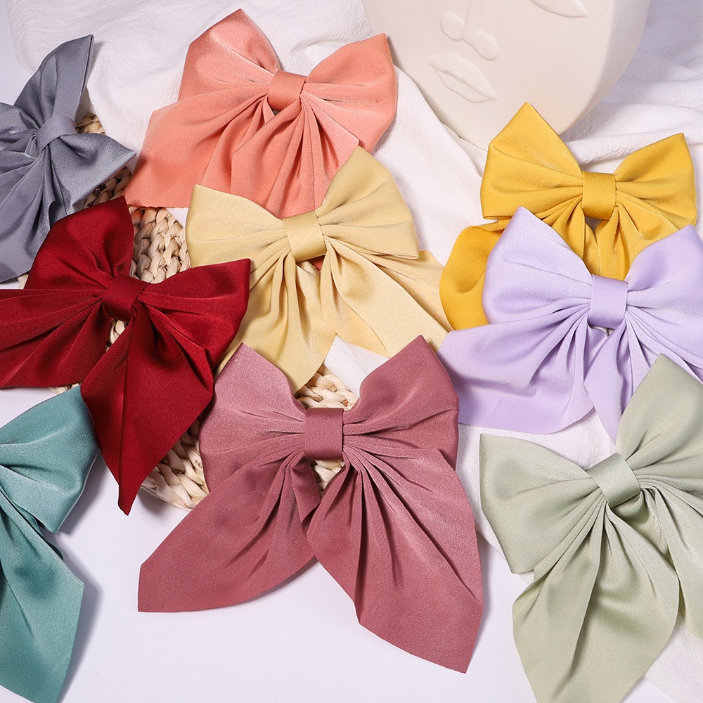 Kẹp tóc Kidsbows hình nơ satin màu trơn ngọt ngào cho bé gái