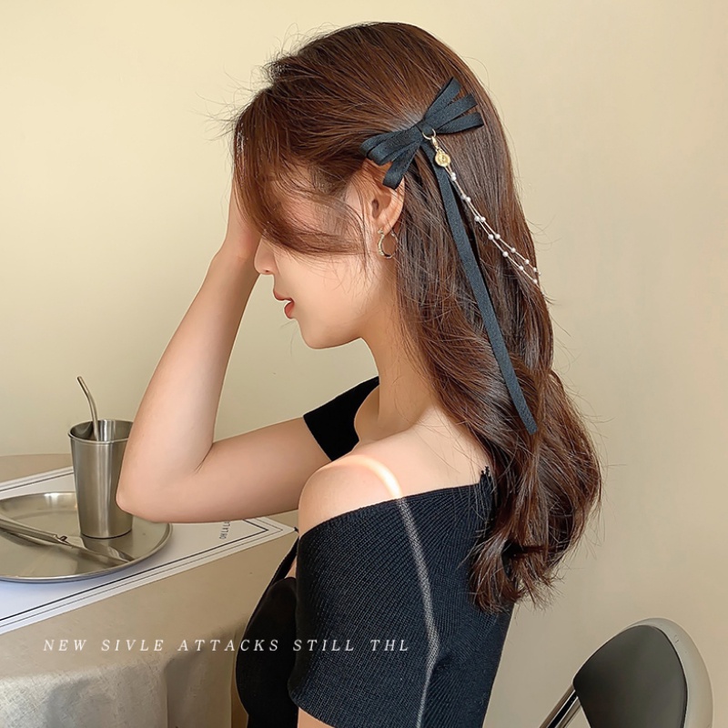 Kẹp tóc ruy băng màu đen thắt nơ phối tua rua thời trang dành cho nữ