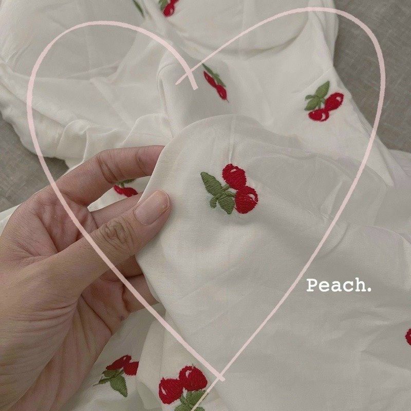 Set đầm hai dây họa tiết quả cherry xếp tầng kèm áo khoác kiểu croptop dài tay siêu xinh màu trắng có mút ngực