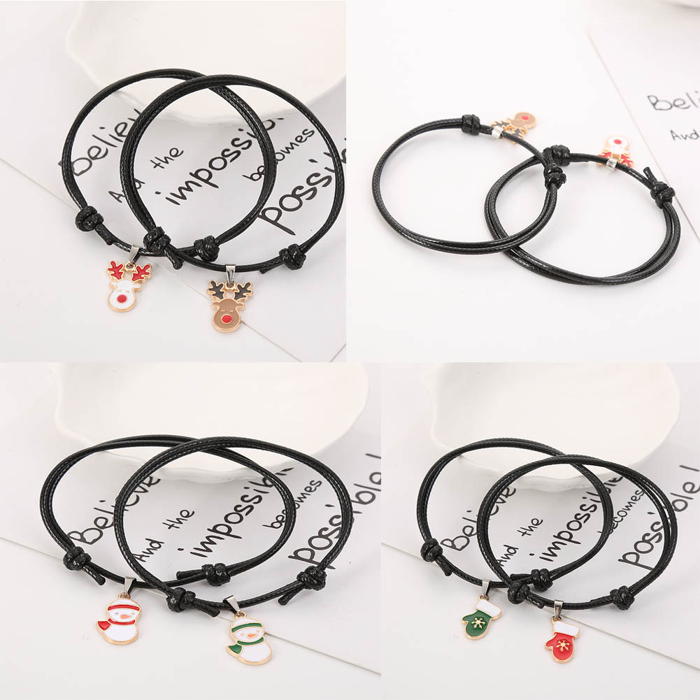 Vòng đeo tay màu đen chủ đề Giáng Sinh xinh xắn