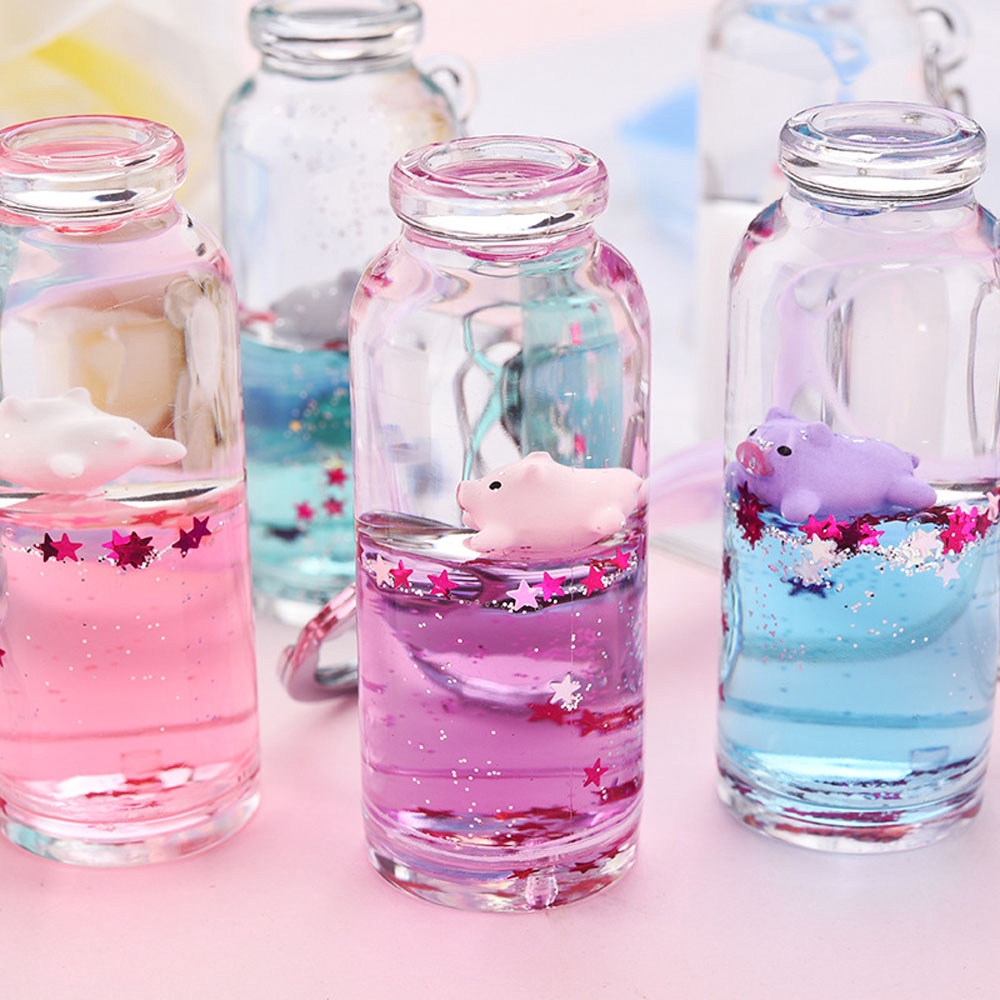 Móc Khóa Hình Lọ Nước Kim Tuyến Nước Độc Đáo