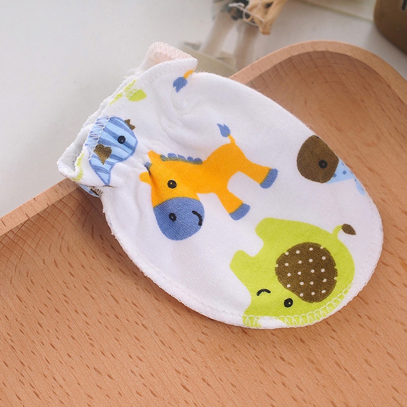 Găng tay cotton chống cào và trầy xước cho em bé sơ sinh