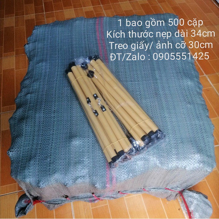 1  BAO ống trúc( nẹp) treo ảnh.Ống trúc(nẹp) treo giấy viết thư pháp.Ống trúc( nẹp) treo lịch, tranh, giấy a3. Dài 34cm