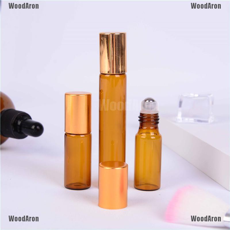 Bộ 5 chai thủy tinh rỗng đựng nước hoa/tinh dầu màu hổ phách 5/10ml | BigBuy360 - bigbuy360.vn