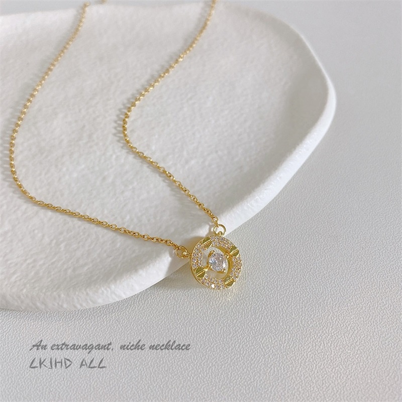 Dây chuyền thép titan mặt tròn đính đá Zircon