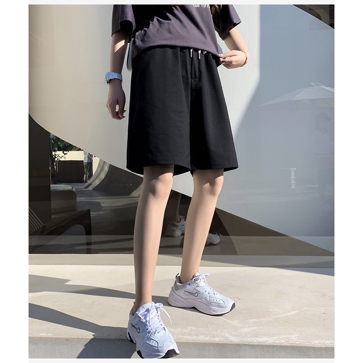 Quần đùi unisex nam nữ phản quang form rộng chất dài mịn phong cách hàn quốc 2 màu Trắng Đen basic