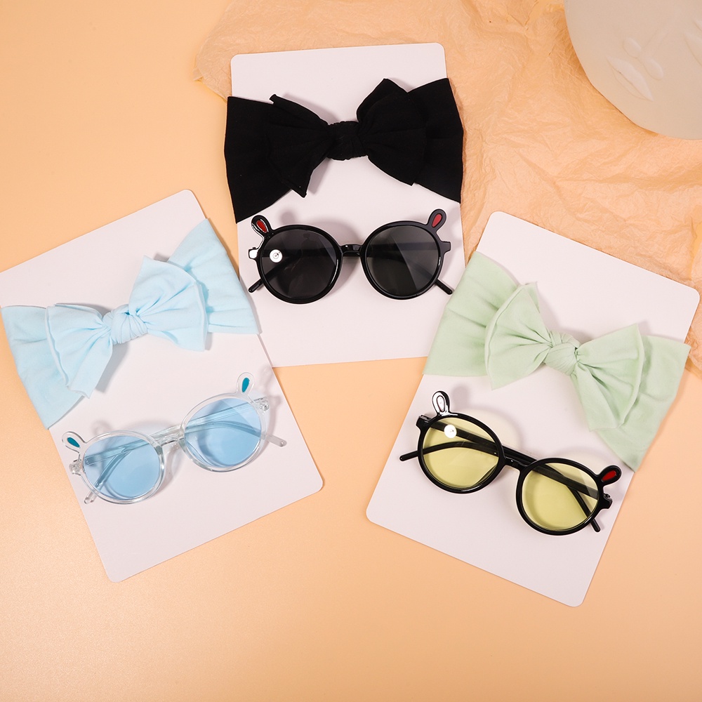 Set 2 phụ kiện KIDSBOWS gồm băng đô nơ chất liệu nylon co giãn và kính mát thời trang đáng yêu cho bé gái