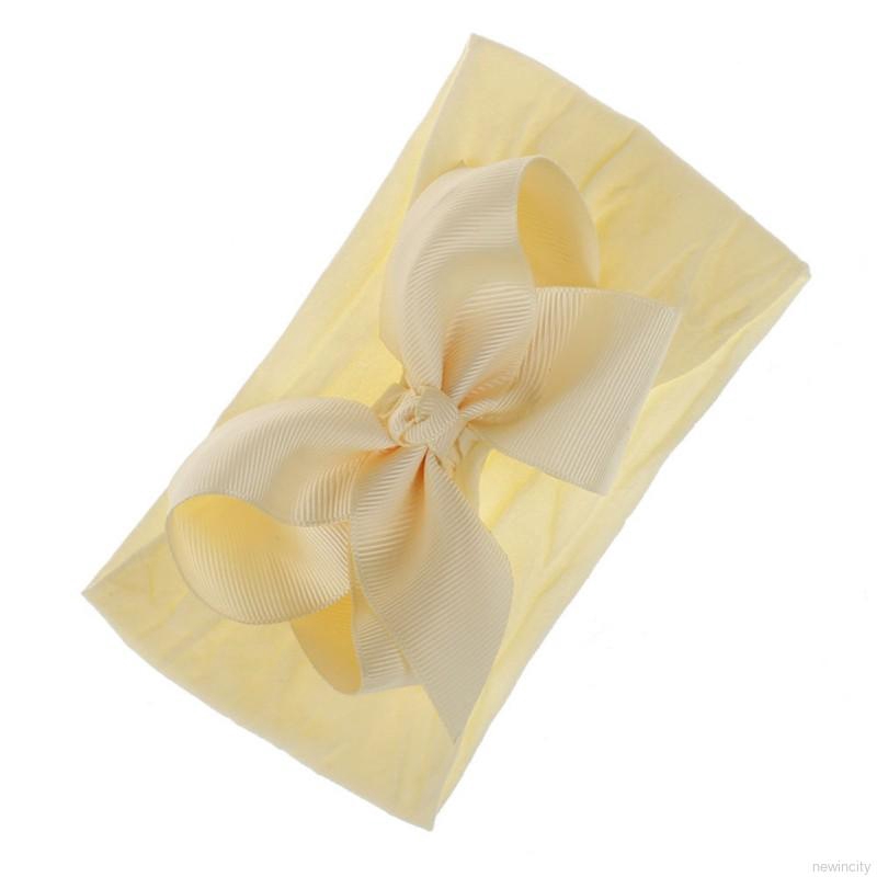 Băng đô nơ co dãn cho bé gái