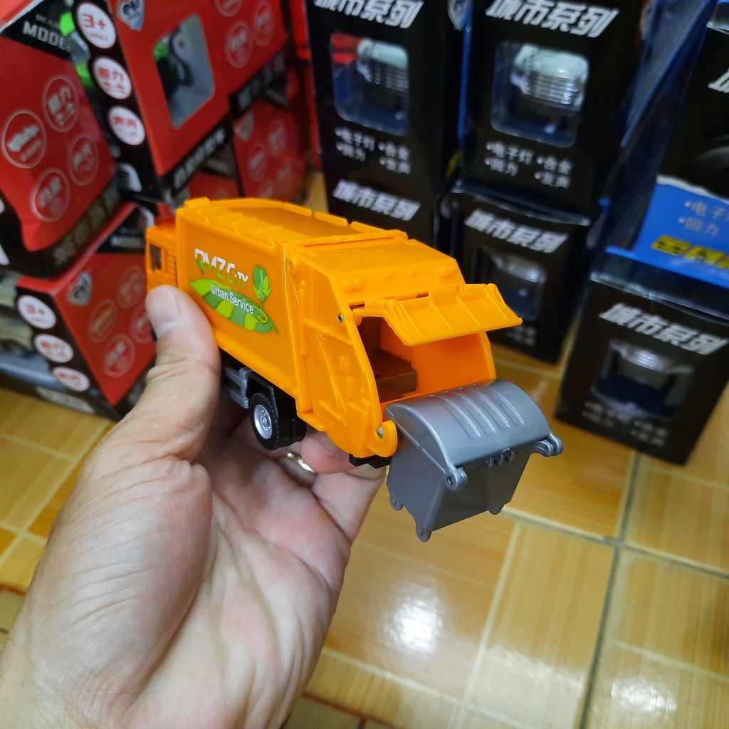 Đồ chơi trẻ em xe ô tô chở rác mini đầu MAN cabin bằng sắt tỉ lệ 1:64 màu VÀNG CAM