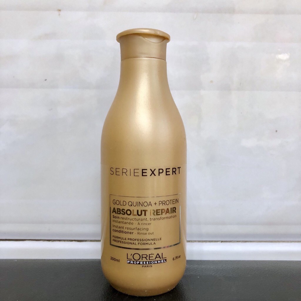 Cặp dầu gội, dầu xả chăm sóc tóc khô xơ, hư tổn Loreal Gold Quinoa + Protein Absolut Repair 500ml