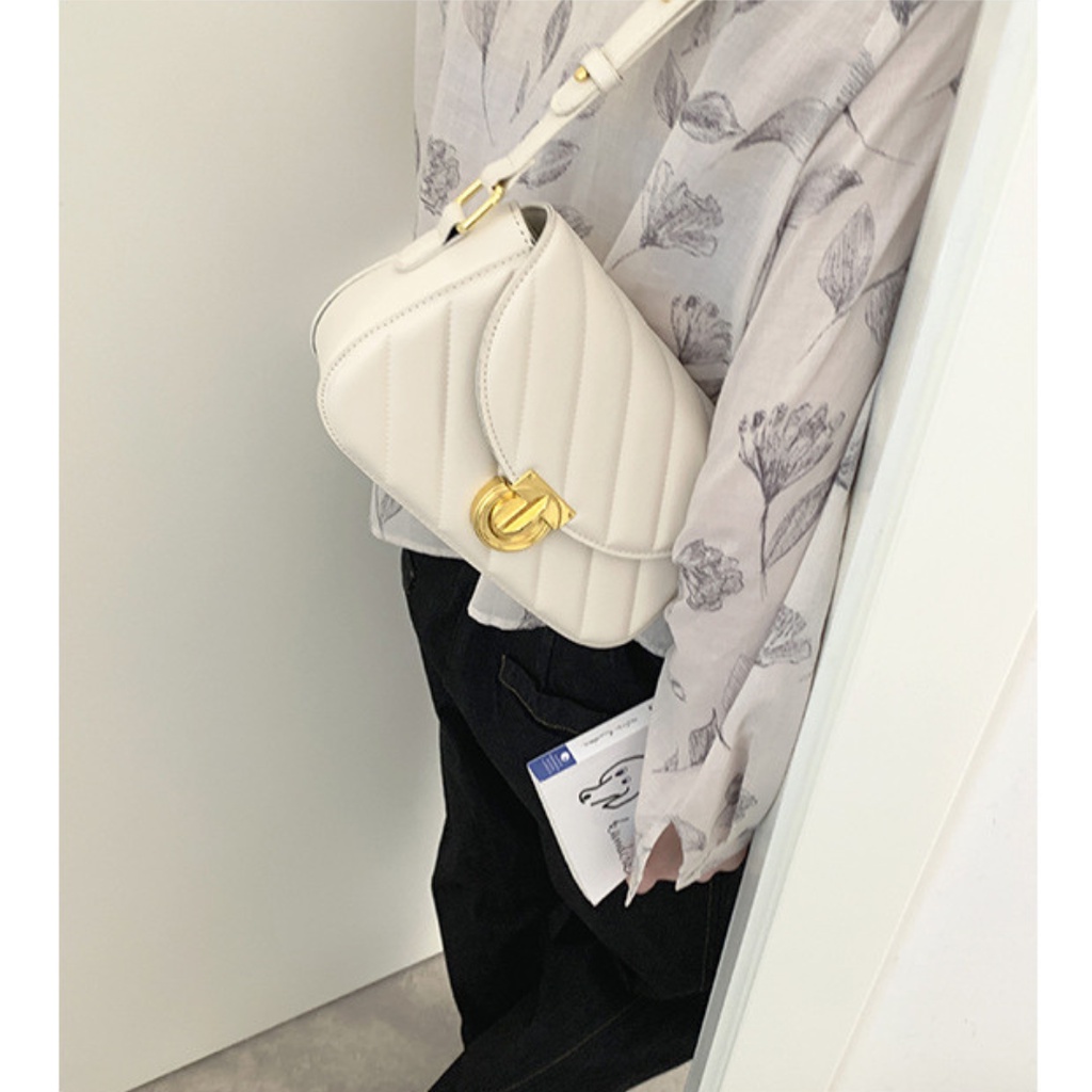 Túi đeo vai đeo chéo da mềm trần trám khóa tròn cá tính La.orie - La011