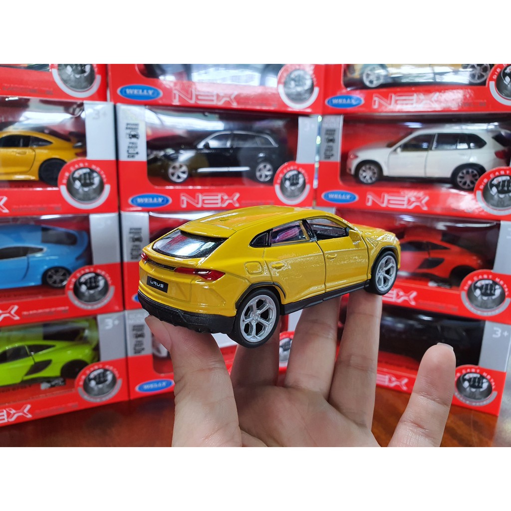 Xe Mô Hình Lamborghini Urus 1:34 Welly ( Vàng )