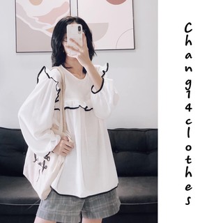 Áo sơ mi bèo viền đen trước ngực
