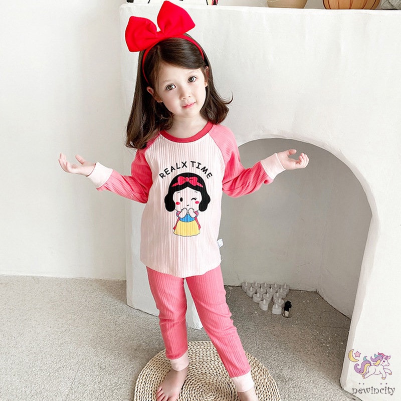 Bộ trang phục gồm áo và quần bó sát lưng cao họa tiết hoạt hình màu tươi sáng kiểu dáng Hàn Quốc thoải mái cho bé gái