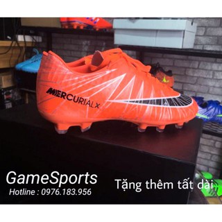 .e giầy đá bóng đinh cao cr7 màu cam ..