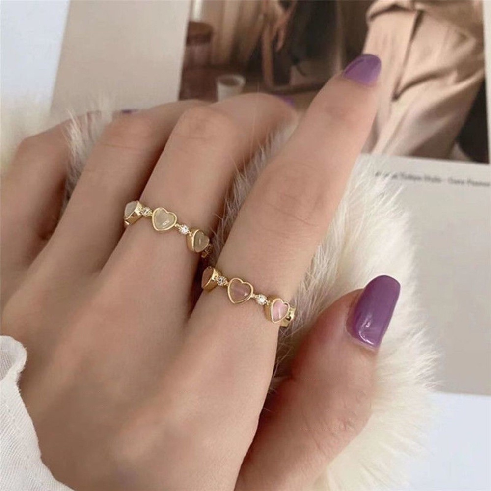 1 Nhẫn Đeo Ngón Tay Hình Trái Tim Khoét Lỗ Đính Đá zircon Thời Trang Cho Nữ