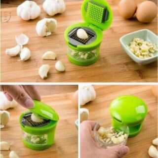 Dụng cụ dập tỏi ....