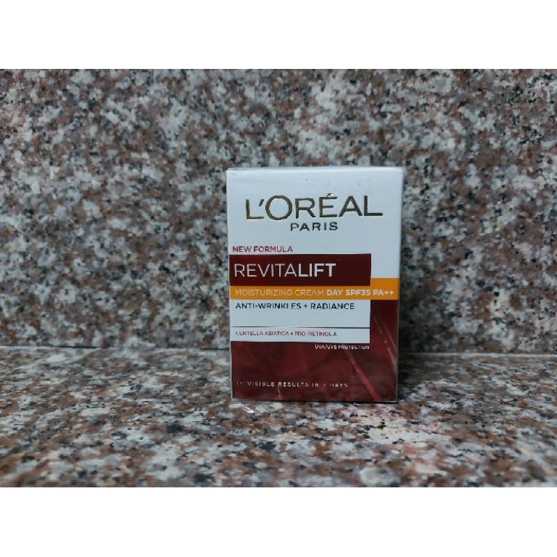 Kem dưỡng chống lão hóa và giảm nếp nhăn ban ngày và đêm Loreal Revitalift 20ml