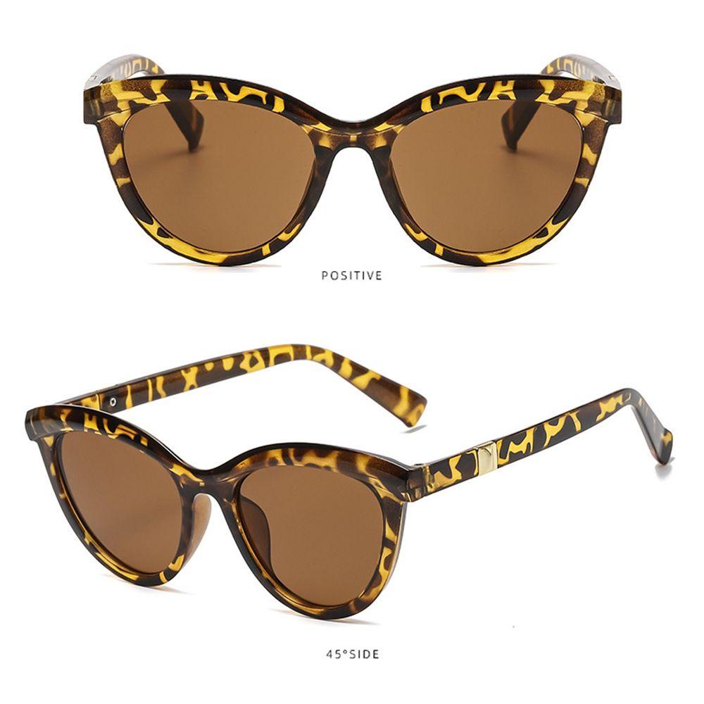 Kính Mát Mắt Mèo Nam Nữ Gọng Tròn