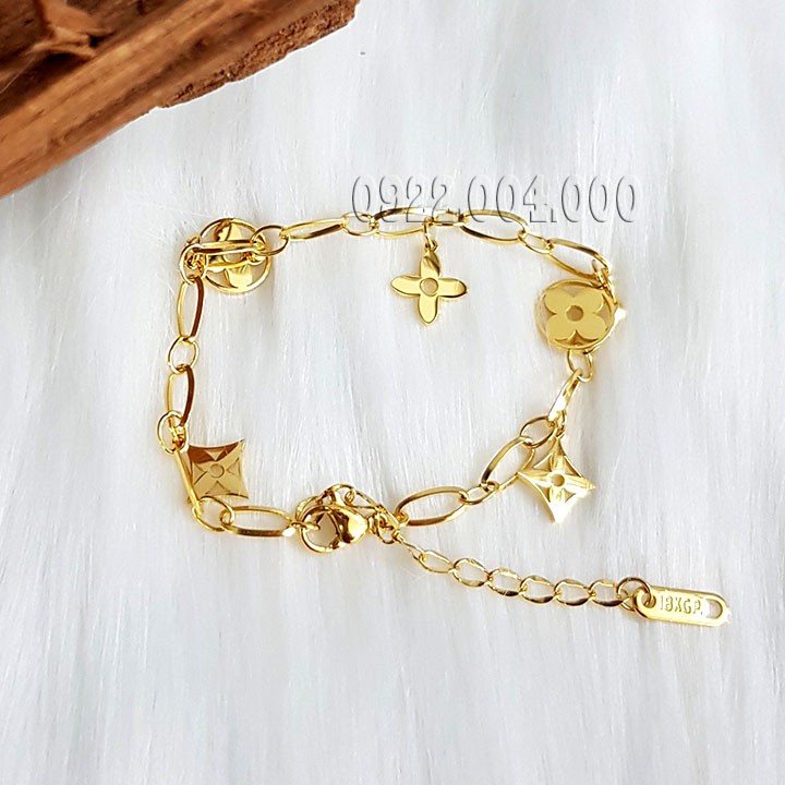 Lắc tay titan nữ hoa 4 cánh LZ1635.