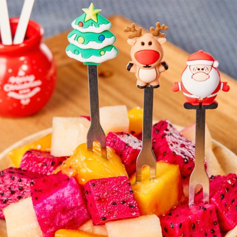 Nĩa ăn trái cây bằng sứ và silicone thiết kế hình ông già noel sáng tạo ngộ nghĩnh