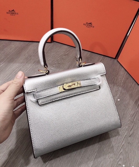 Túi hm dáng cao khoá vàng