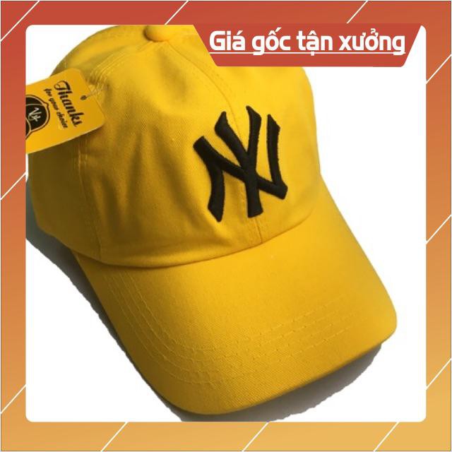 Mũ NY màu vàng đậm .